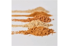 Image small piles of powder on blank sheet